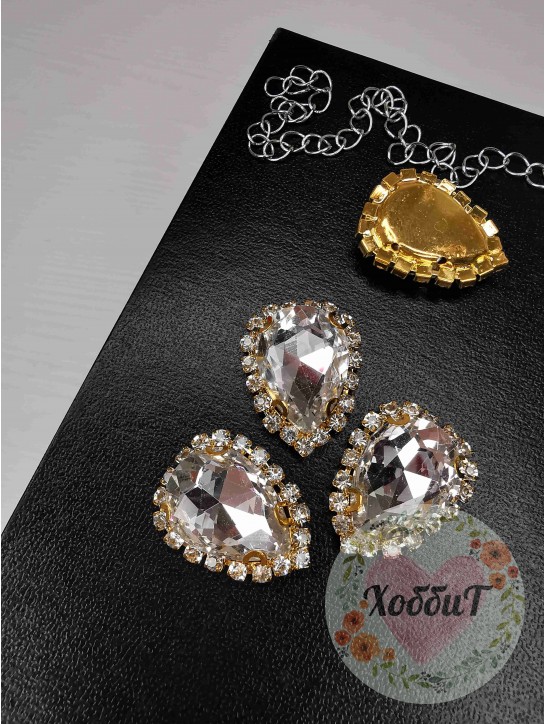 Стразы пришивные в золотой оправе "Капля" 17*23мм. (серебро)